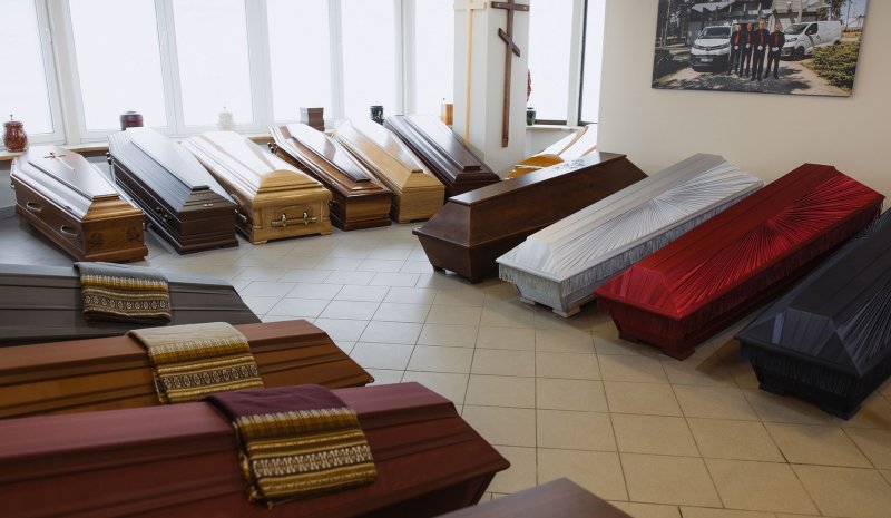 Zolitudes street Angel Funeral agency interior view with selection of caskets