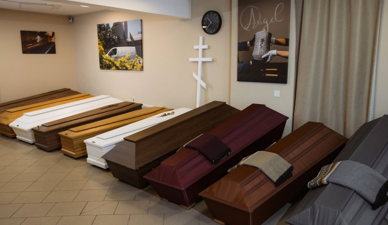 Wide selection of caskets at Zolitudes street Angel Funeral agency interior view